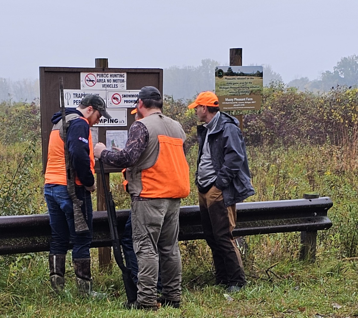 Hunters reviewing information
